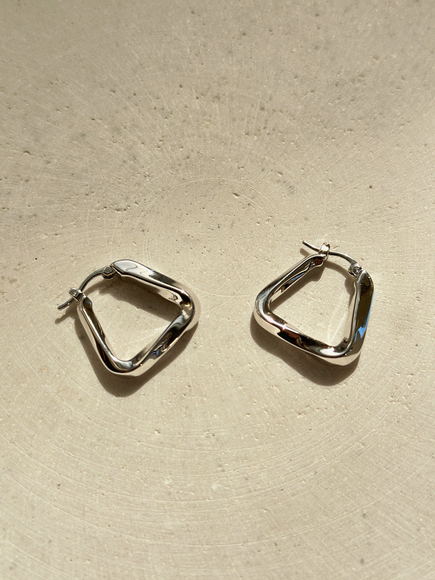 Twisted Trapezoid Hoops